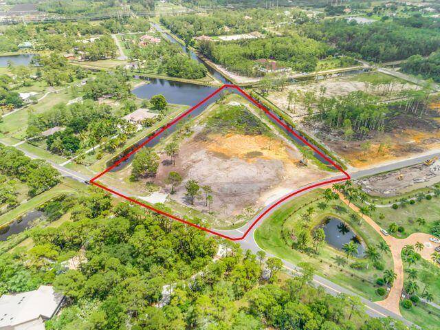 BUILD YOUR DREAM HOME ! BEAUTIFUL CORNER 5 ACRE CLEARED LOT, BOARDERED BY WATER ON TWO SIDES.