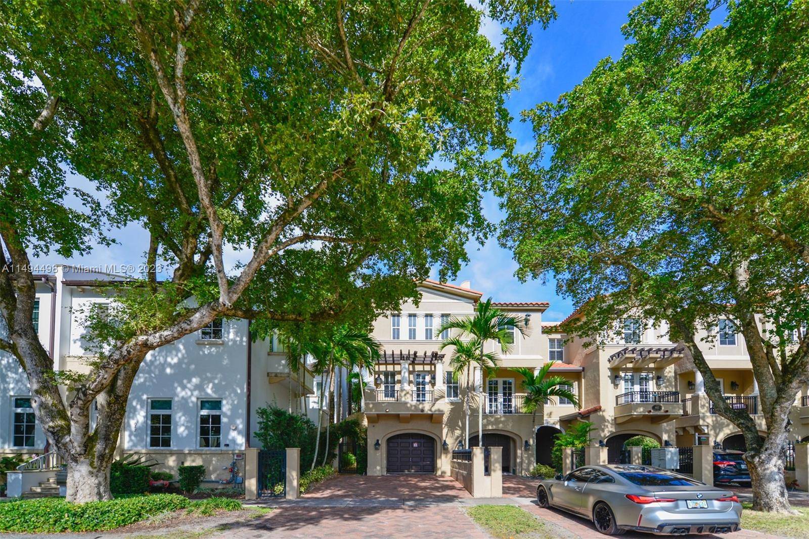 Beautiful rarely available corner townhouse in the heart of Coral Gables.