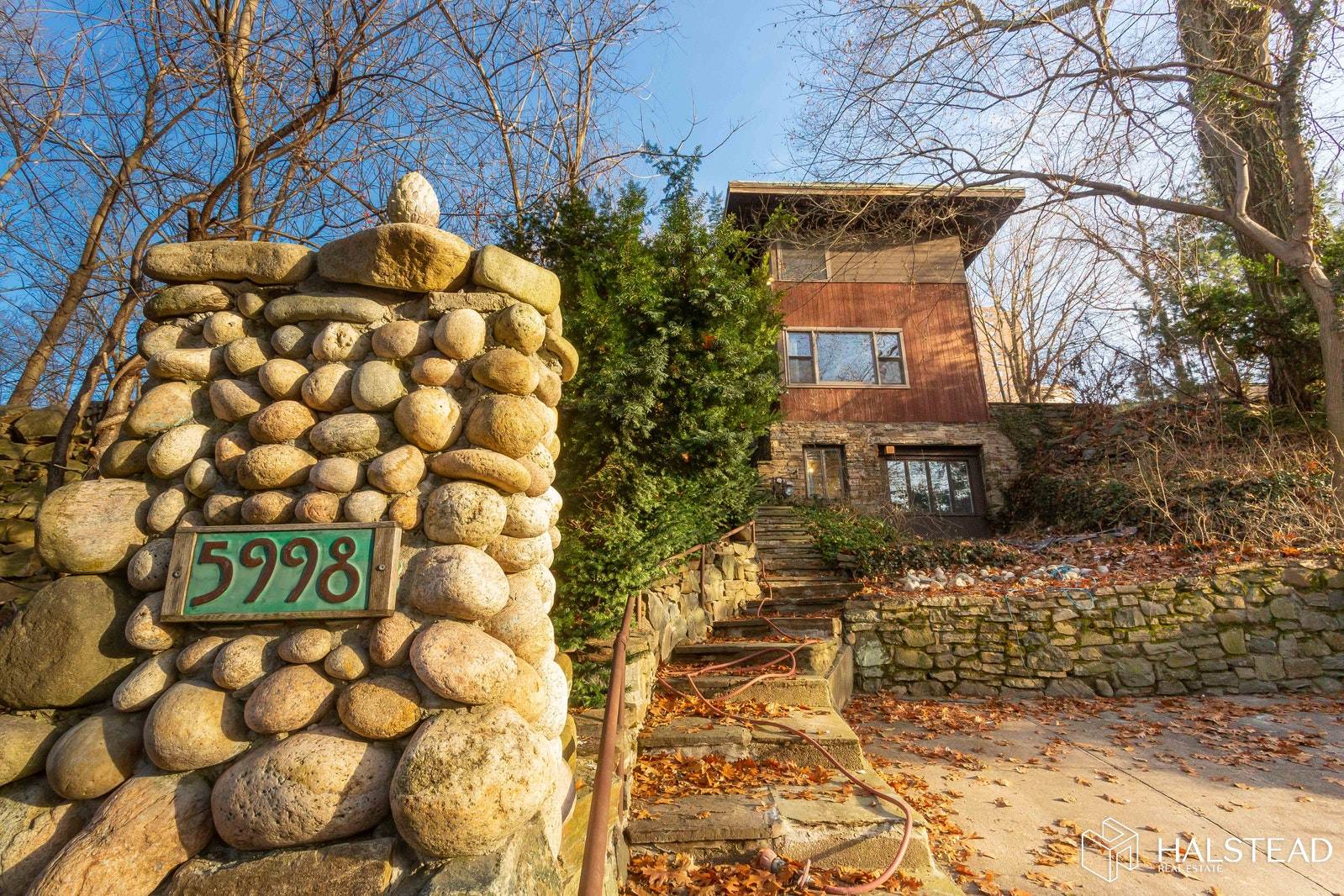 This Frank Lloyd Wright inspired home built circa 1938 is a unique North Riverdale Treasure.