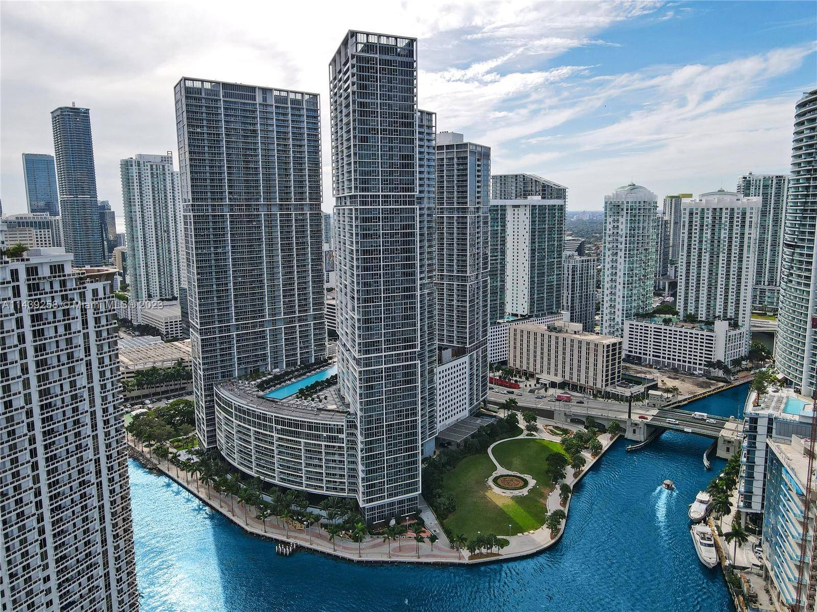 Very rarely listed, beautiful 02 Line Corner Unit directly on the Miami River with unobstructed views of Biscayne Bay all the way to the Atlantic Ocean, and overlooking the Rooftop ...
