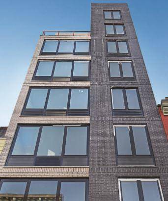 977 Manhattan Avenue is a newly constructed investment property comprised of 14 spacious one bedroom apartments and two thousand 2, 000 square feet of prime commercial space.