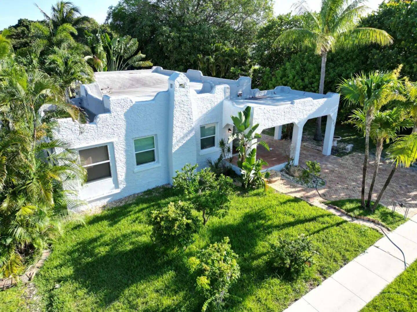 Take advantage of an exceptional opportunity to own a meticulously renovated Spanish Mission style beach home, fully furnished for your immediate enjoyment.