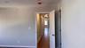 Hallway view from primary bdrm