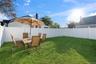View of fenced backyard
