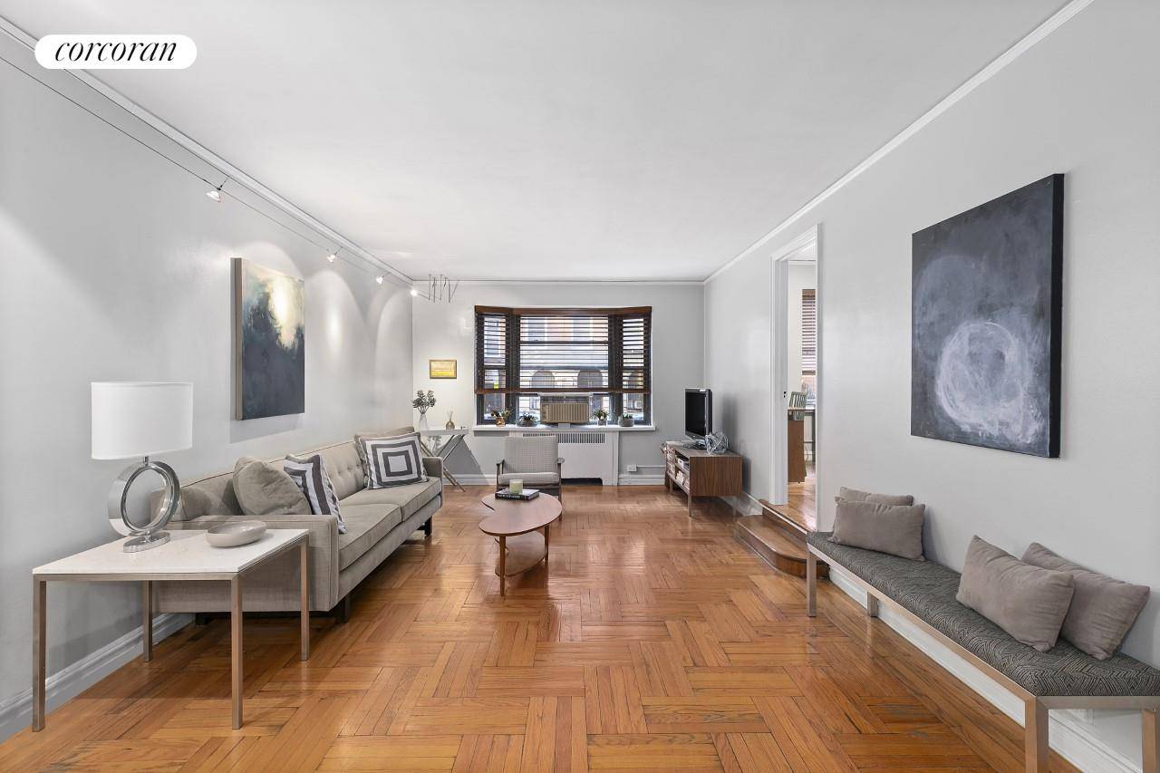 Live comfortably in the heart of the Upper East Side, in this beautiful, spacious split two bedroom one bathroom apartment in a charming prewar building.