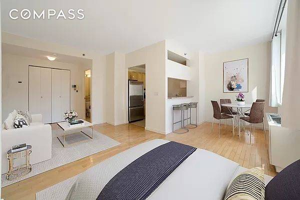 Come home to this bright and tranquil alcove studio with views in the heart of Kips Bay !