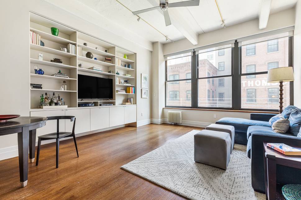 This exceptional loft will captivate you with its soaring 11 foot ceilings and protected exposure overlooking Washington Street.