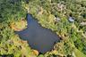 Aerial view of property's location featuring a nearby body of water