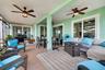 Large screened in Lanai is great for entertaining and dining and has 5 sliders leading out to it.