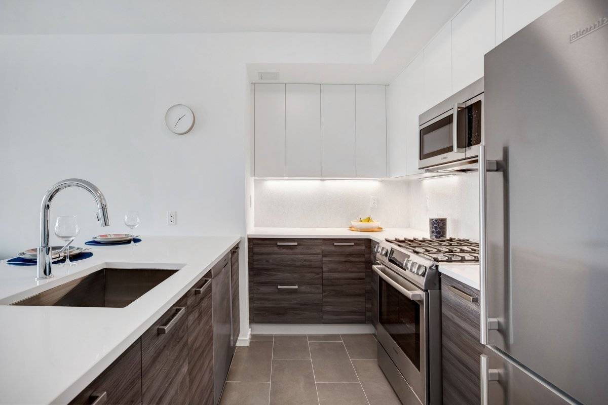 The Ammann, a brand new condominium at 40 Pinehurst Ave, Unit 4B is a 1 bedroom 1 bathroom featuring, PRIAVTE outdoor space, floor to ceiling, triple paned windows, Entertain around ...