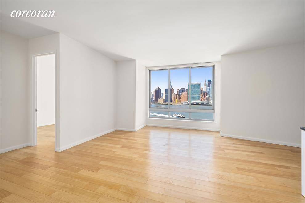Located at 46 30 Center Boulevard, the coveted View at East Coast Condominiums, this stunning two bedroom apartment boasts unobstructed, picturesque Manhattan skyline views.