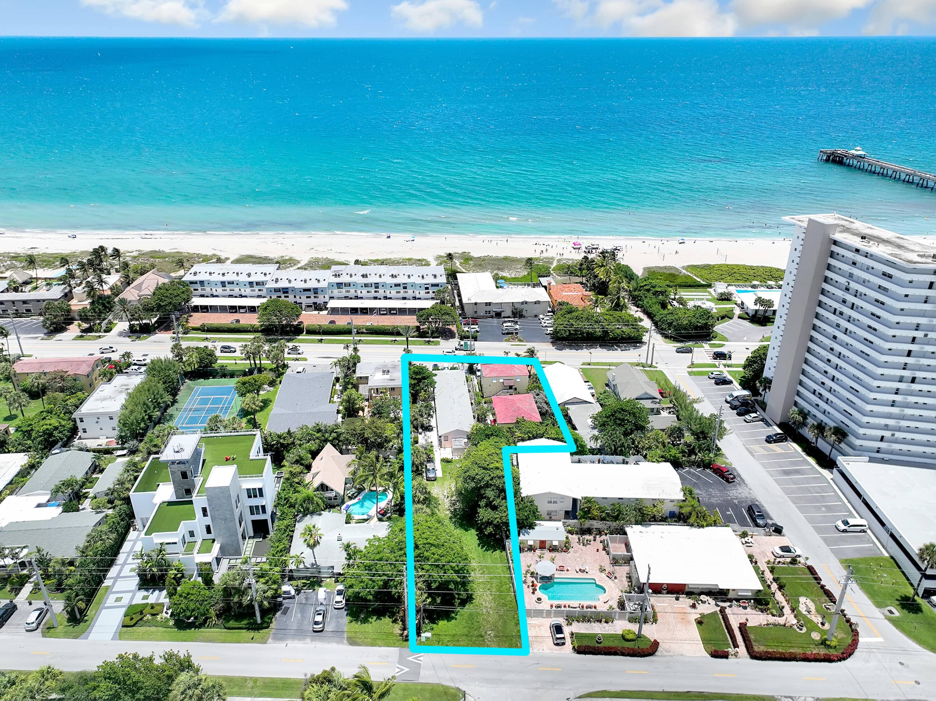Three lots only being sold together in beautiful Deerfield Beach just under an acre with 100' of frontage on A1A directly across from the beach.