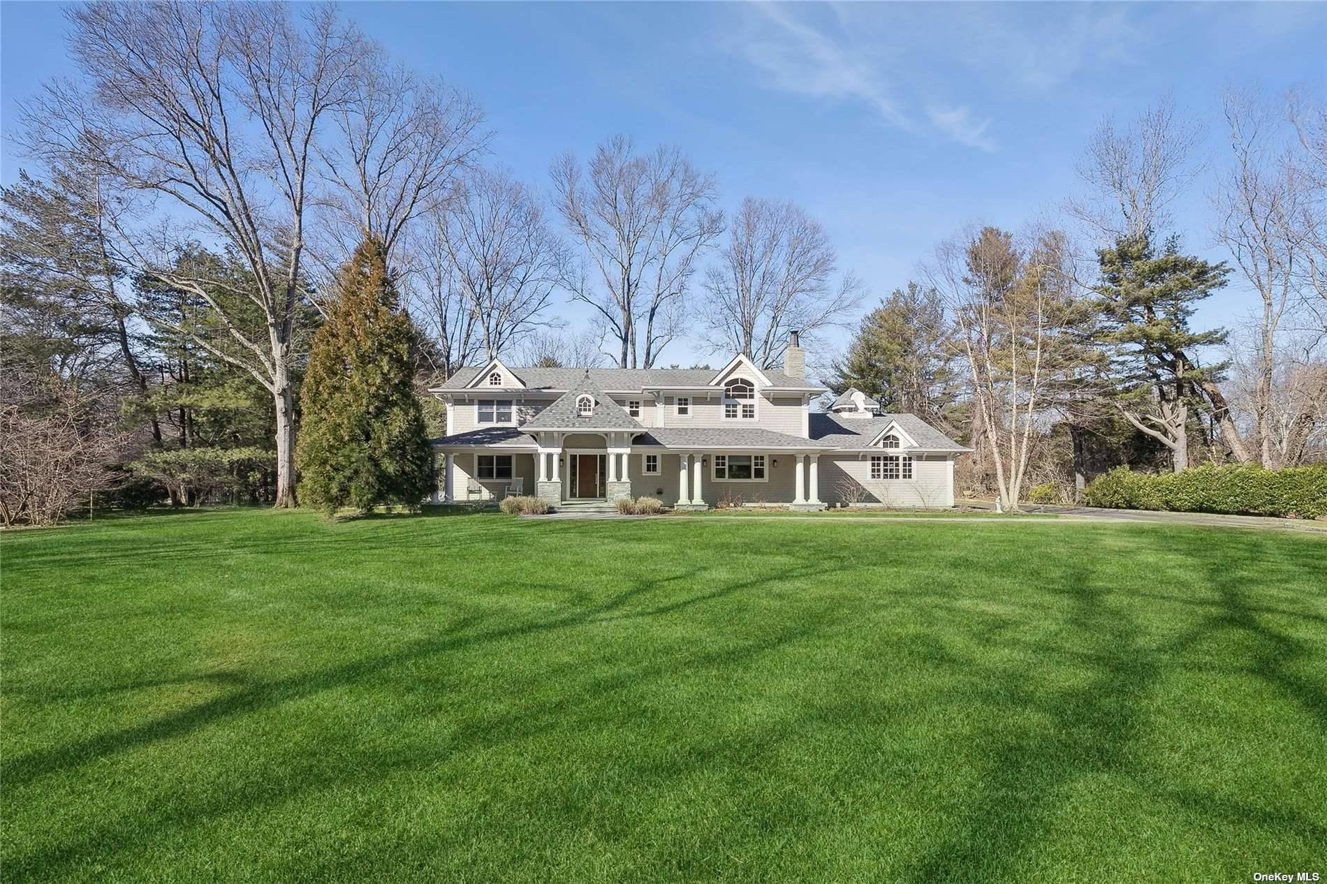 Welcome to this stunning 2 acre home in Jericho Muttontown on Long Island's prestigious North Shore.