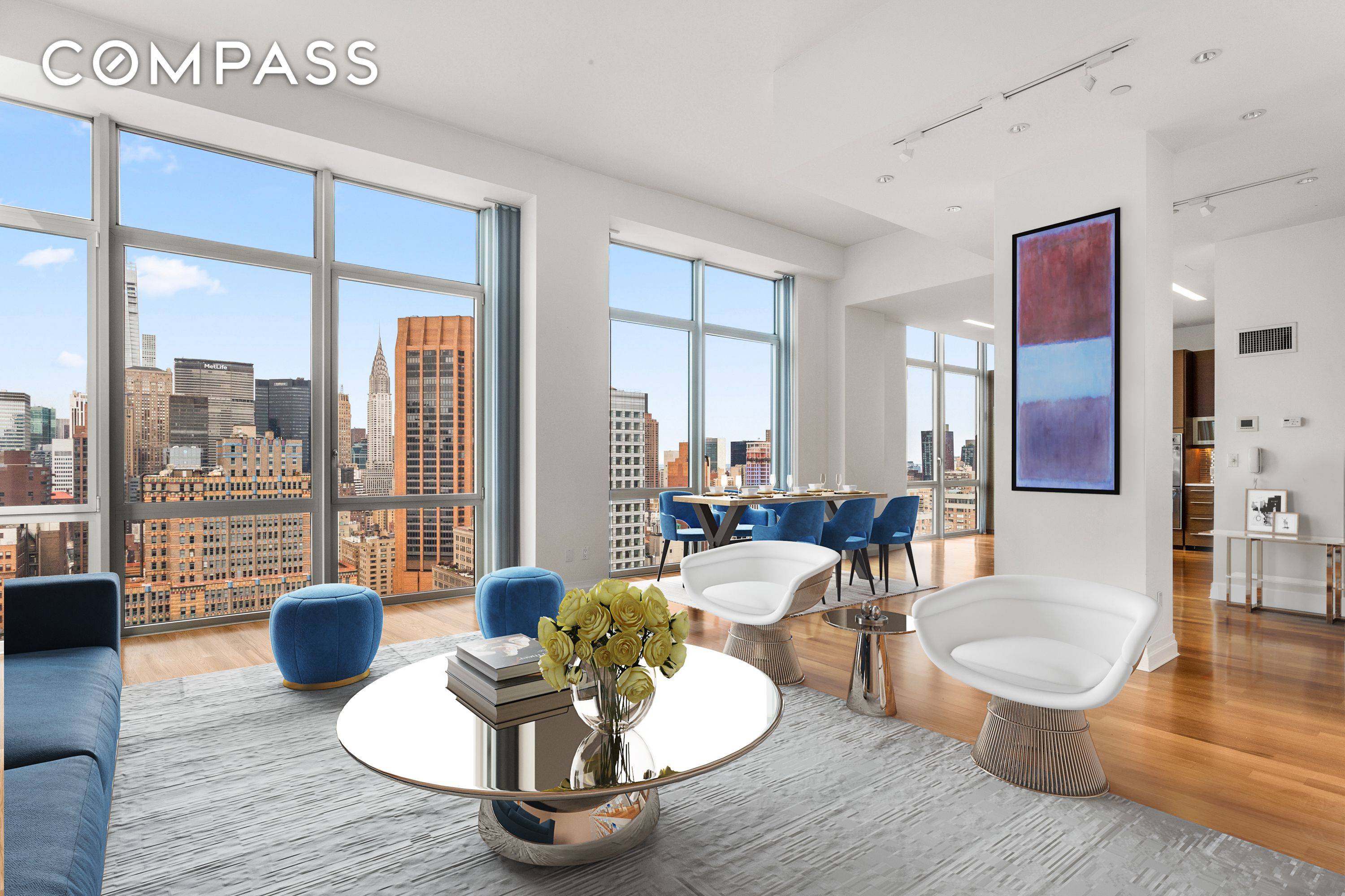 WITH 13' CEILINGS AND PANORAMIC VIEWS this chic NoMad penthouse s rooms are flooded with light and views.