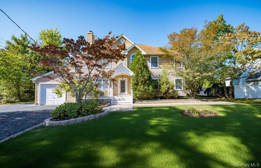 Welcome to this stunning 3, 500 square foot Colonial that perfectly blends timeless elegance with modern functionality.