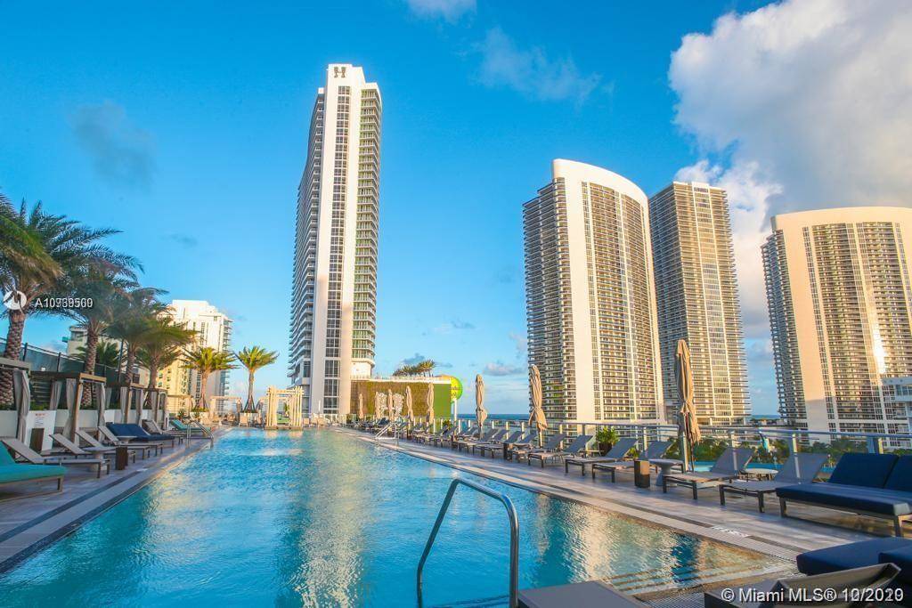 Brand new luxury condo hotel, totally furnished with partial ocean views and pool.