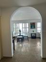 Sala con arcos y vista al mar / Living room with arches & ocean view