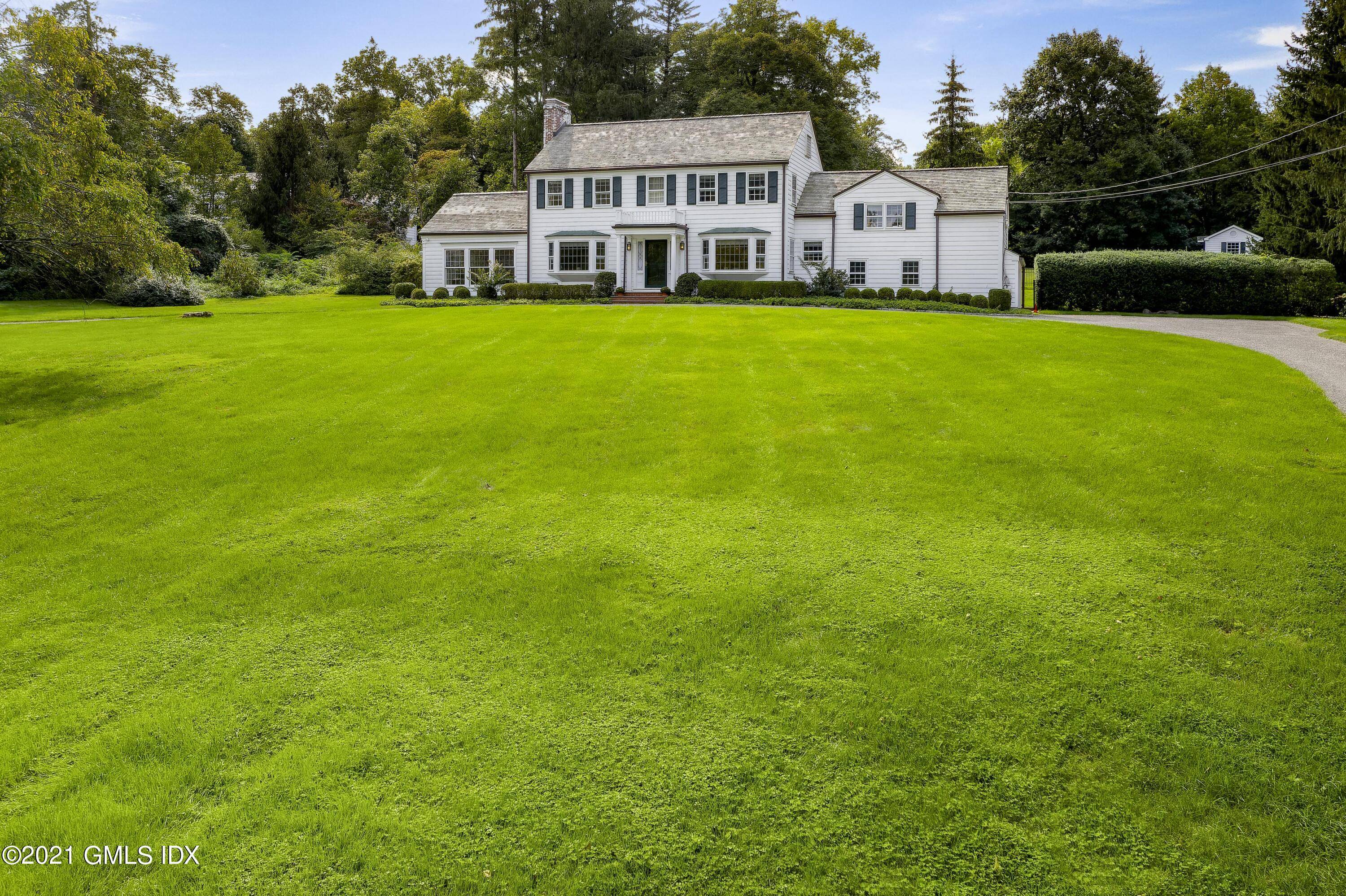 Classic center hall Colonial sits on breathtaking 2.