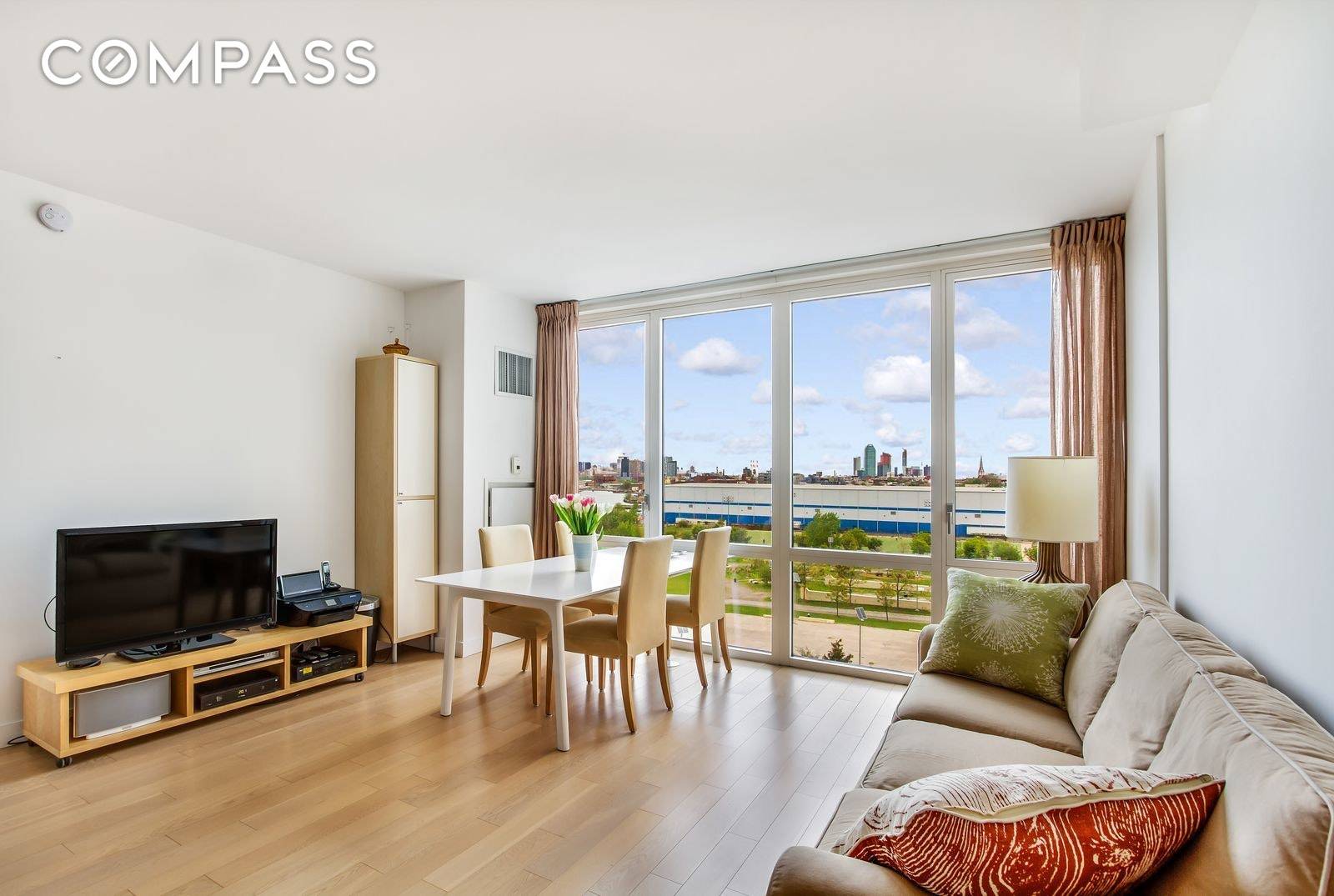 Williamsburg s Premier Condo The EDGE Large 1BD 1BA with Incredible Skyline Views, Chef's Kitchen with Integrated Appliances, M W, D W, Breakfast Bar, Incredible Closet Space Throughout, Washer Dryer ...