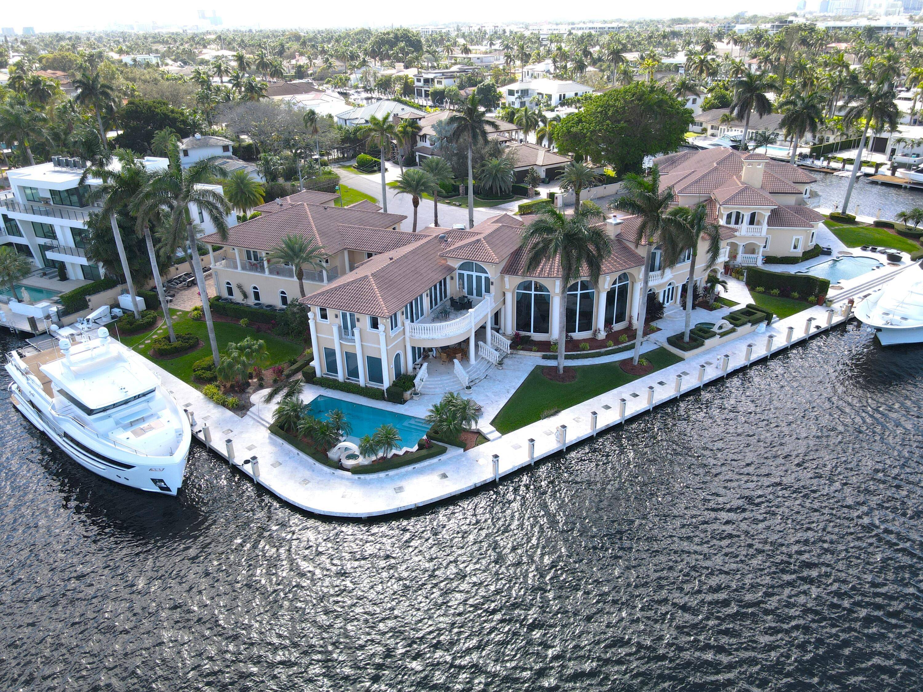 Experience the pinnacle of waterfront luxury with this exceptional point lot, boasting breathtaking views of the Rio Barcelona Canal and the Intracoastal.