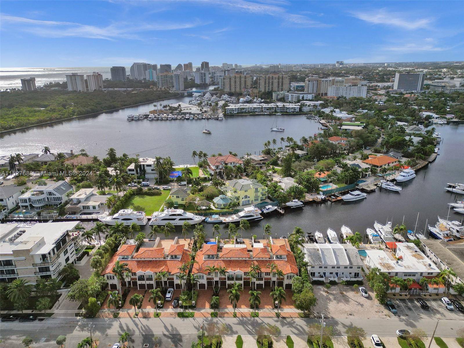 Spectacular location ! Luxury waterfront tri level townhome with private dock on deep water canal.