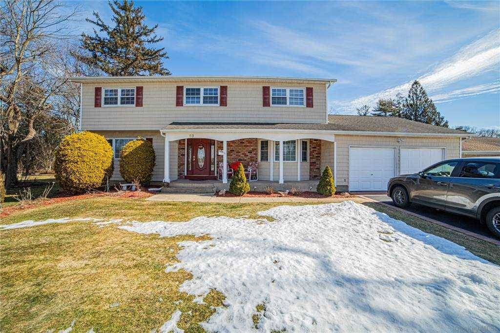 Beautiful, large colonial home with full basement, 2 car garage, new kitchen with porcelain tiles, granite countertops, marble backsplash, new heating system and hot water heater, new CAC, new sewer ...