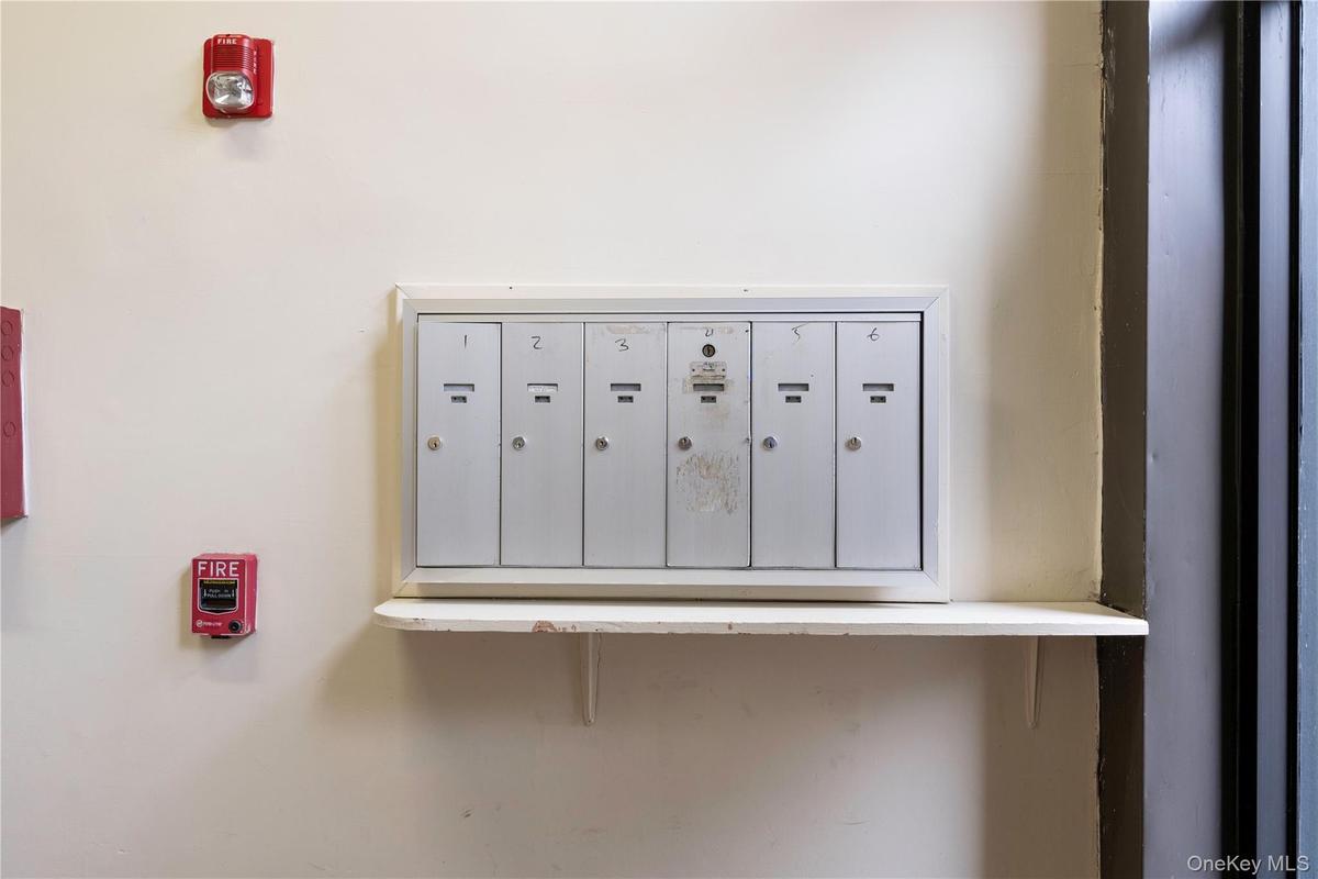 Detailed view of a fire alarm and mail area