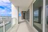 Enjoy stunning views from nearly every room, with floor-to-ceiling glass doors leading to an expansive balcony that invites you to relax and take in t