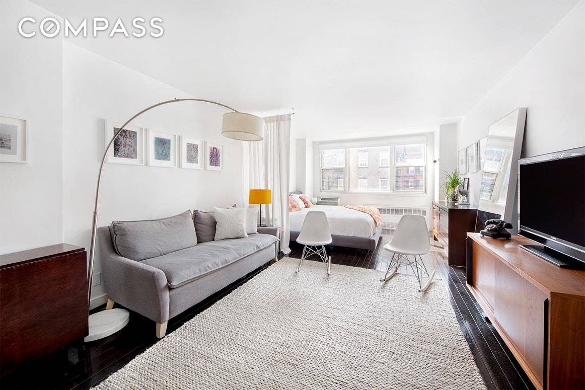 Welcome home to this meticulous designer renovated, over sized, sun flooded loft like studio on coveted Jane Street in the heart of the West Village.
