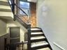 Stairway with brick wall