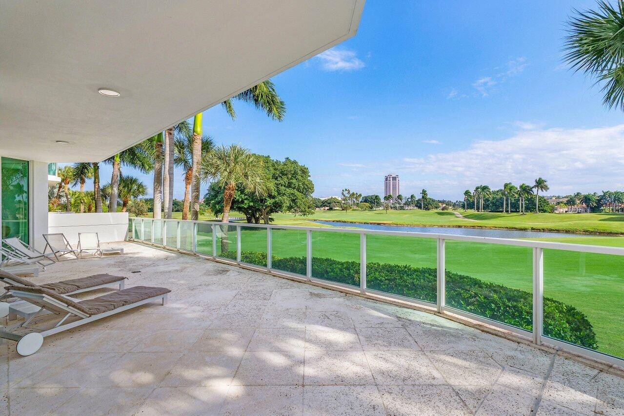 This spectacular lower level 3 bedroom with 3 bath condominium offers panoramic views of the fairway of the Boca Raton Resort golf course.