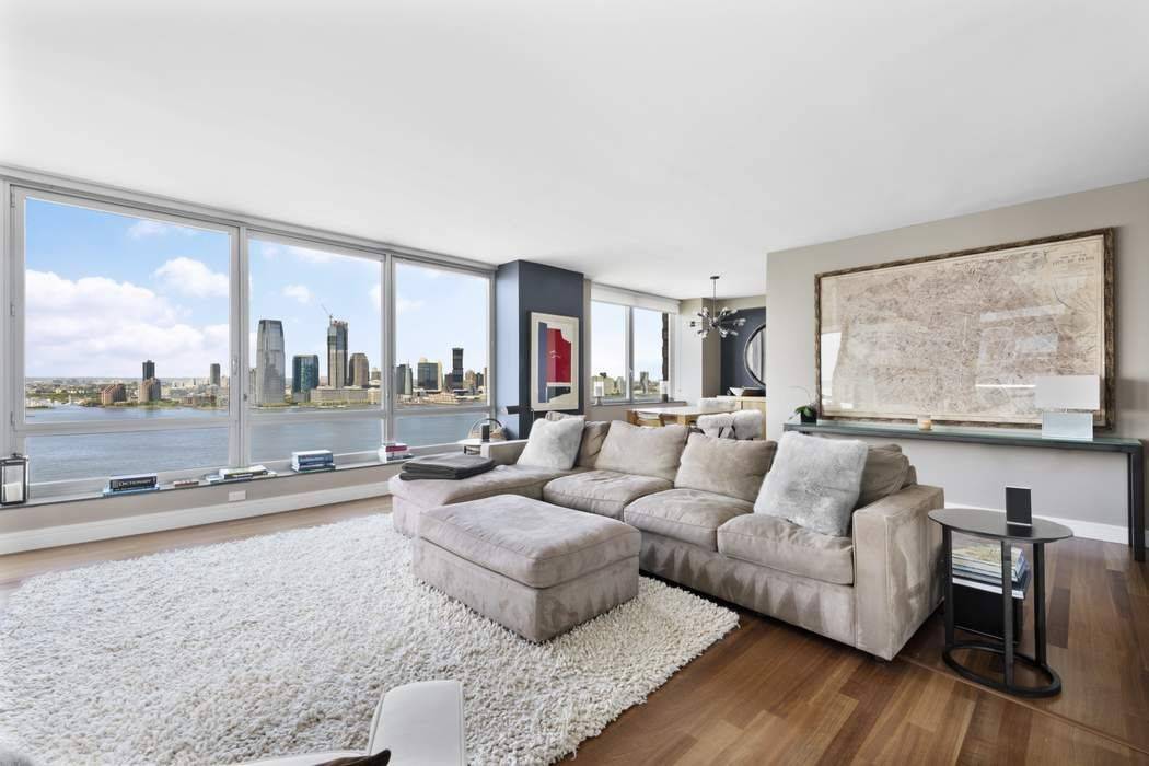 You'll be captivated by the stunning river, Statue of Liberty, sunset views and beyond from this coveted F line 3 bedroom 3.