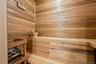 Relaxing sauna / steam room with wooden walls