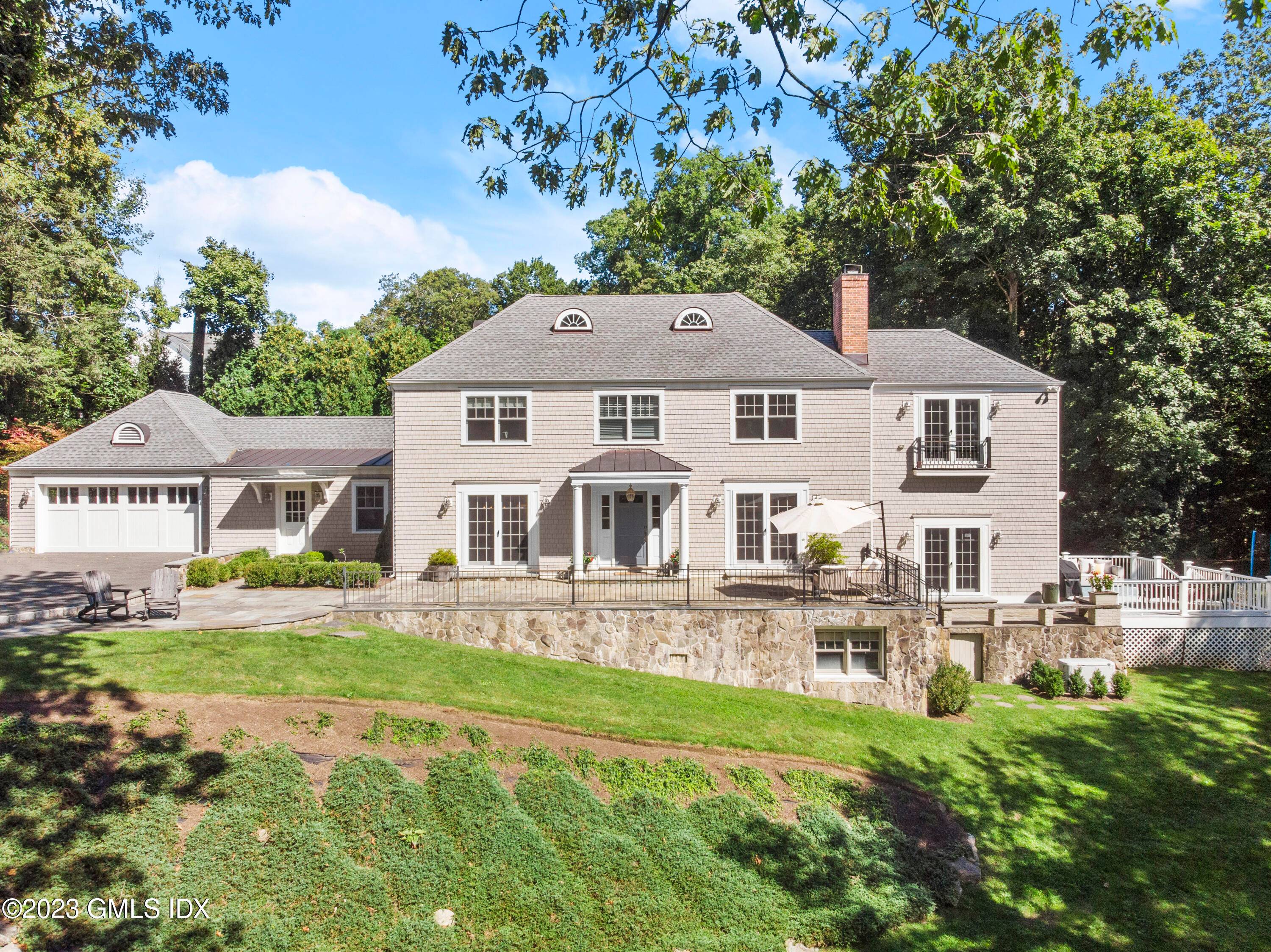 Welcome to this stunning, fully renovated, 5 bedroom, 4 1 2 bath colonial style house nestled on a peaceful cul de sac.