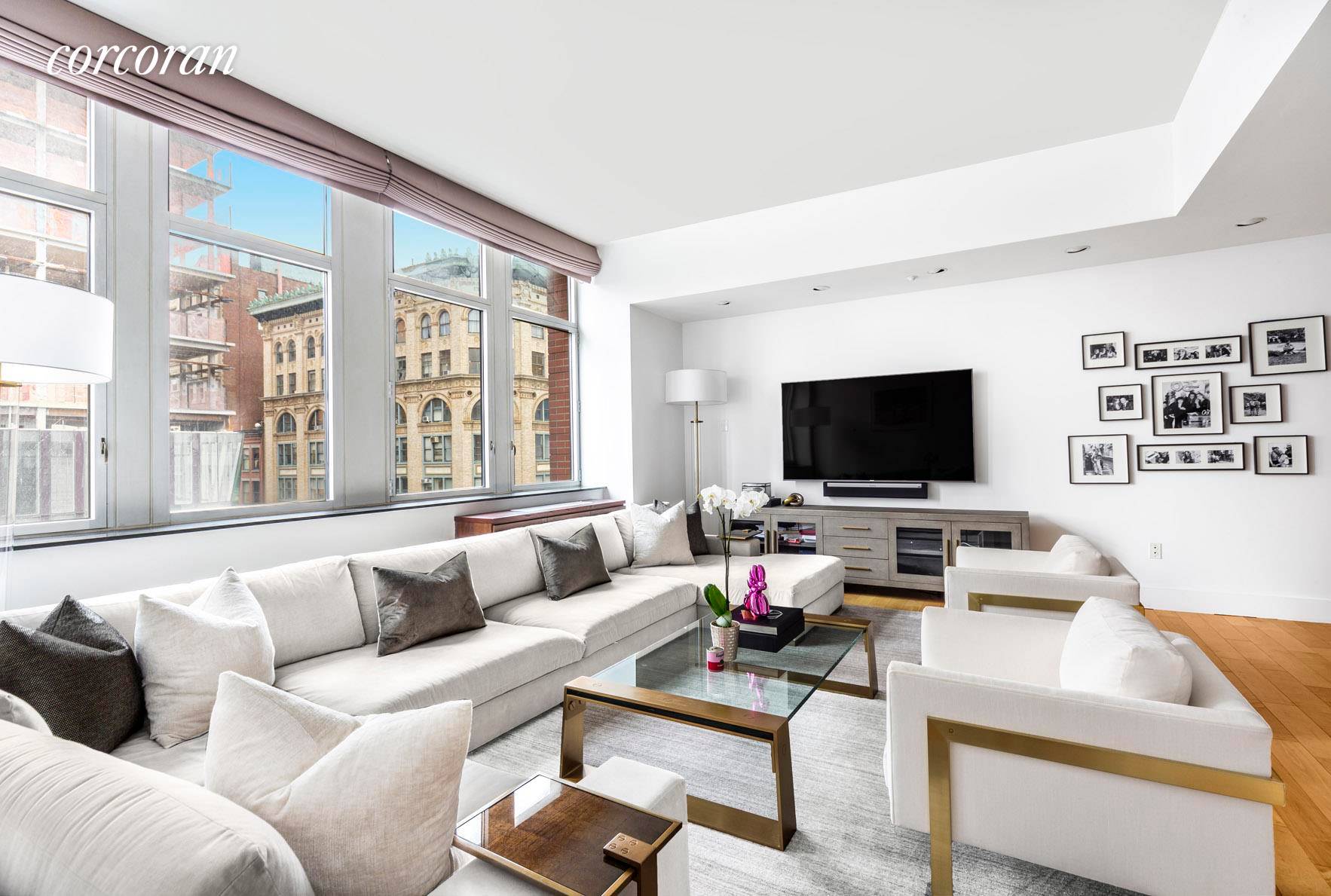 This 2 bedroom, 2 bath loft features gracious living spaces, custom details and tons of storage located in one of Soho's premier doorman condominiums.