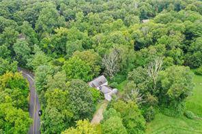 Rare and amazing opportunity to own a home on almost 4 bucolic acres on beautiful Kellogg Drive in Wilton !