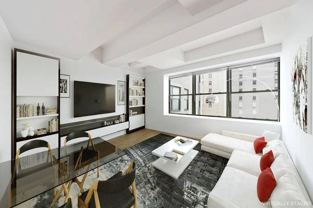 Located in The Heard of Financial District, live in style and luxury with this spacious one bedroom with one full bathroom in the 99 John Deco Loft Condominium.