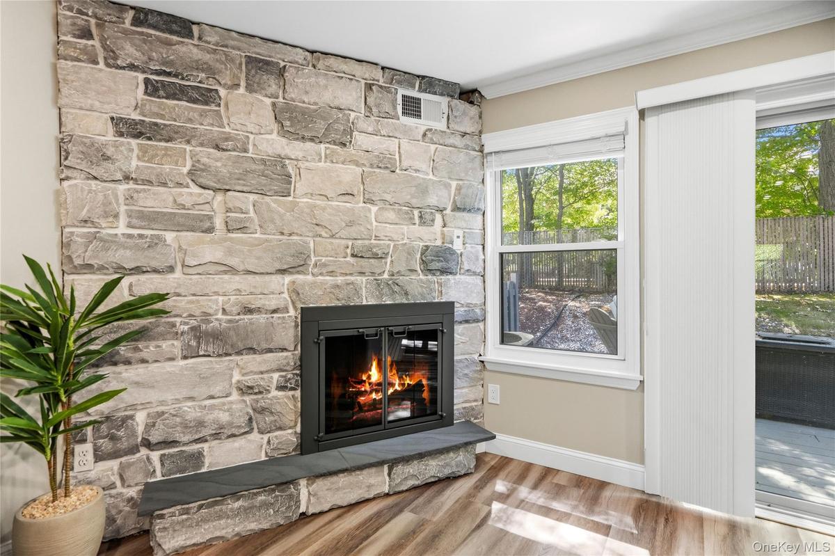 Beautiful stone wood burning fireplace