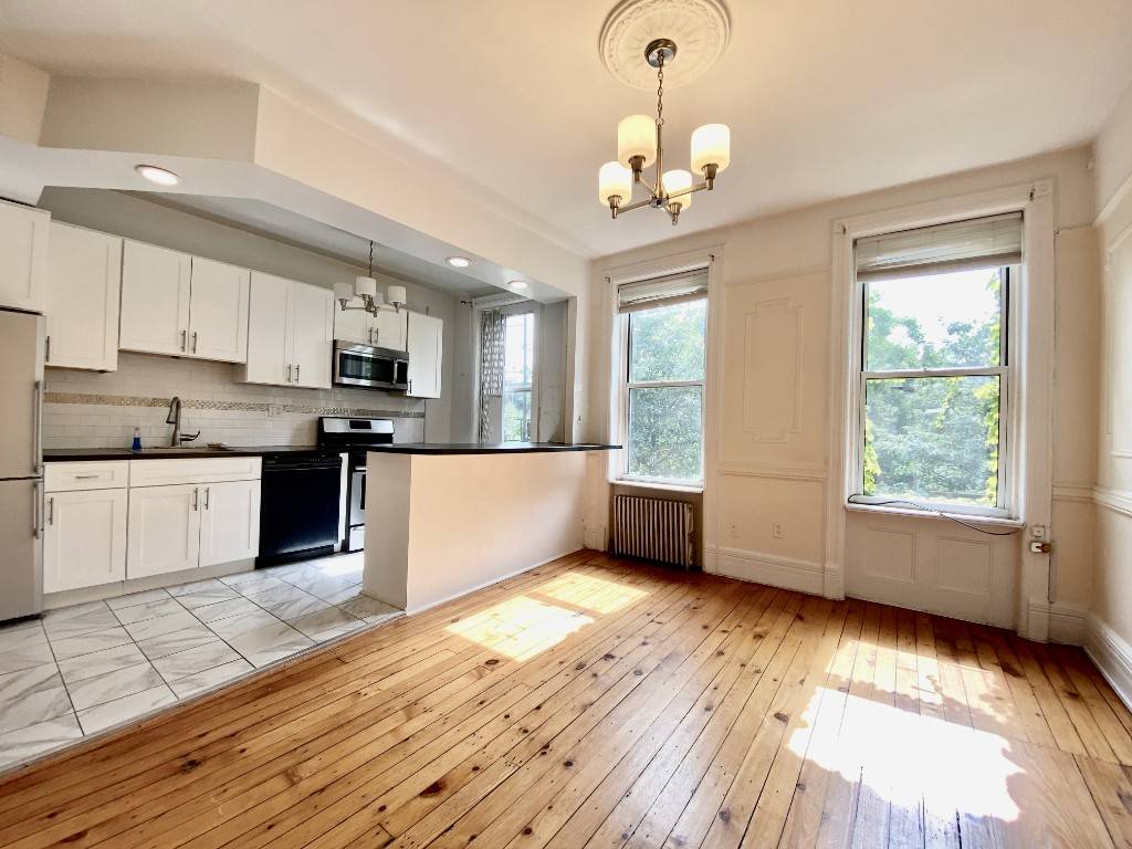 2 Bedroom Railroad Floor Through Apartment on the 3rd Floor in Brownstone in Park Slope Modern open renovated kitchen, with stainless appliances and dishwasher Historic features, decorative fireplace, exposed brick ...