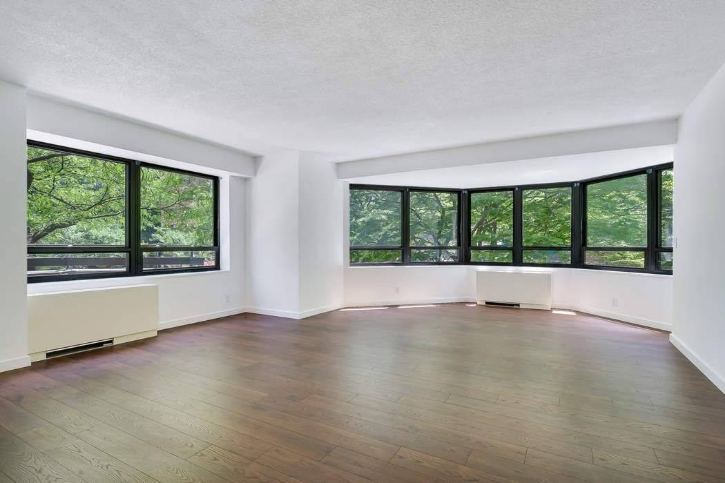 Welcome to this beautiful, expansive, sun blasted, renovated 2 bedroom 1.