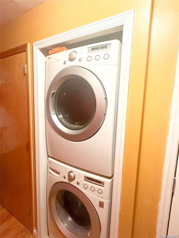 Washroom with stacked washer / dryer