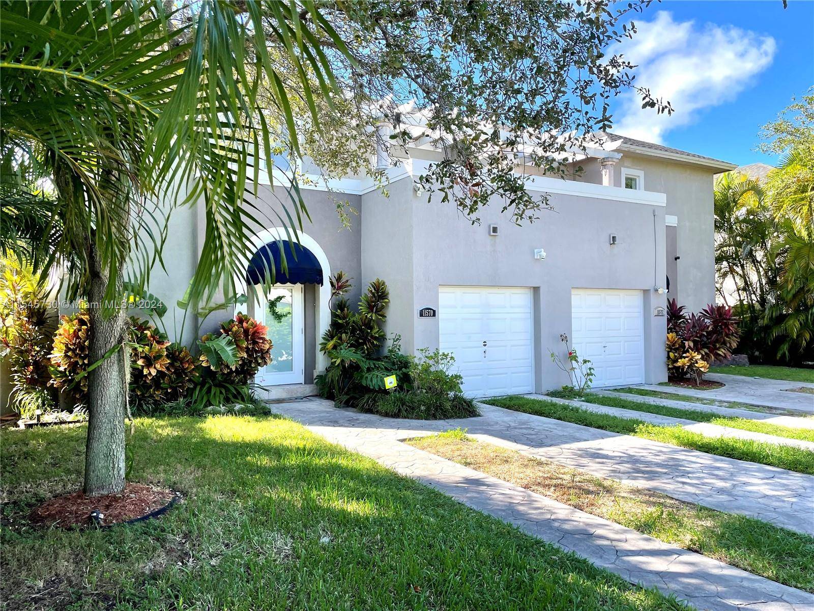 Lots to love ! Contemporary 2 story townhome in Biscayne Park Miami Shores area, minutes from every convenience.