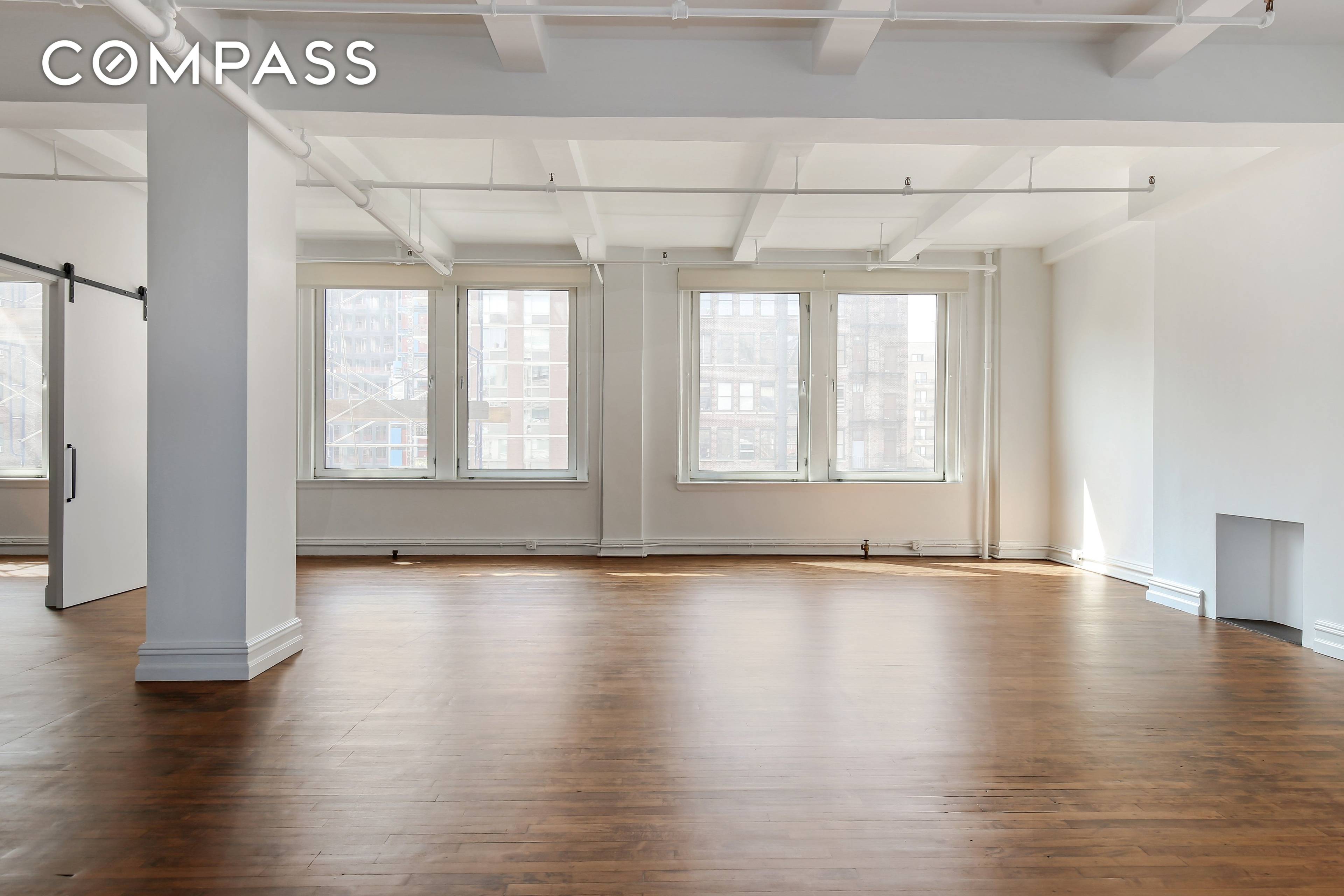 Massive 4100 SF Full Floor Loft with nearly 12 Foot ceilings and fantastic light and city views from 3 exposures.