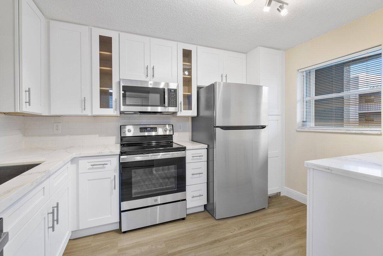 Dont miss this newly renovated, 1st floor condo located in Sabal Pine South in Delray Beach, minutes from the 95 freeway, shopping, and quick 10 min drive to Atlantic Ave.