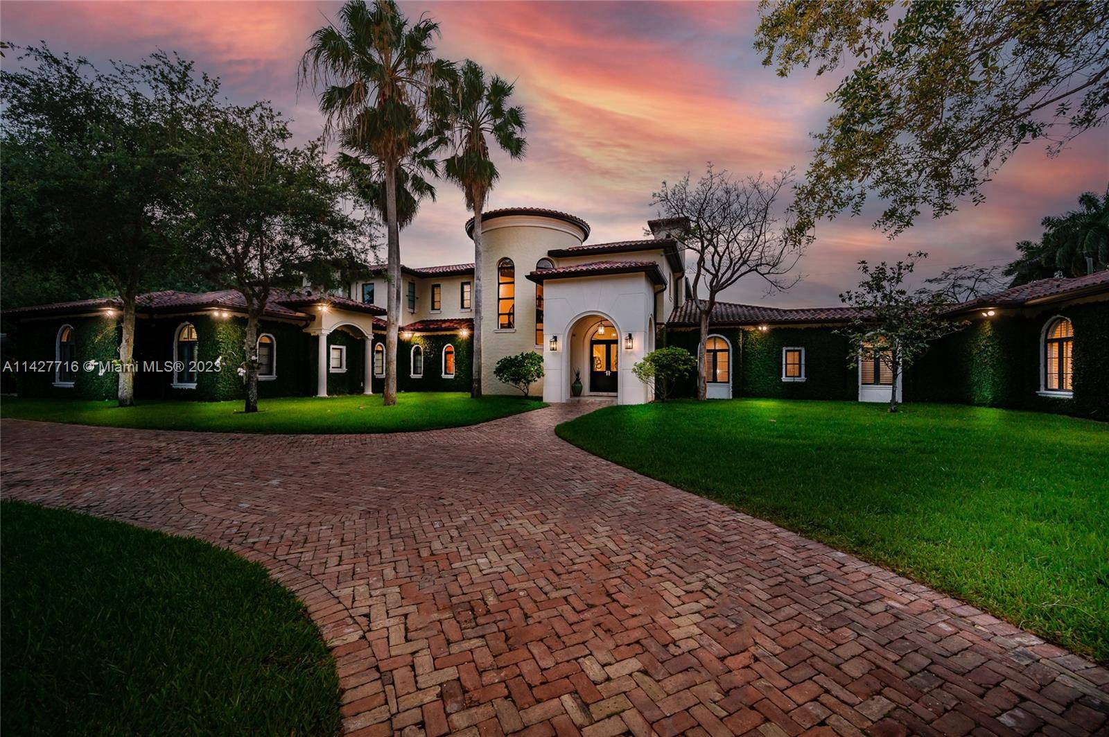 Nestled in a quiet no thru street is this magnificent custom built estate in sought after Pinecrest.