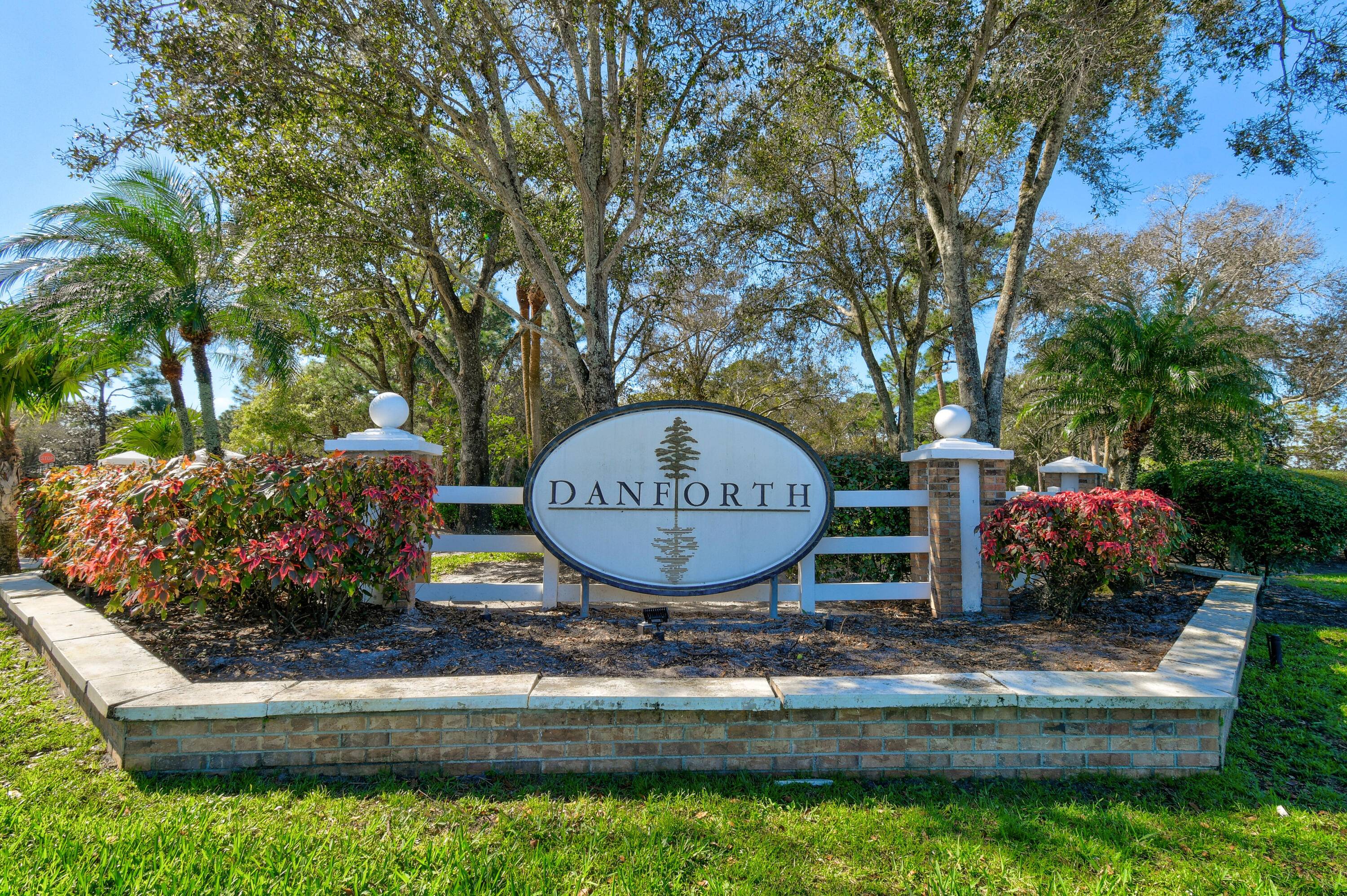 Beautifully and tastefully landscaped oversized lot in the gated community of Danforth Palm City.