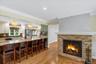 As you enter you are greeted into the living room overlooking open concept kitchen.