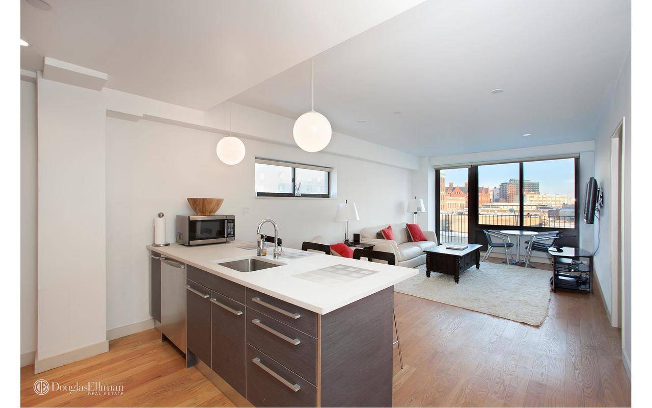 4G is a bright east facing 1 bedroom plus home office condo featuring balcony, windowed powder room, hardwood through out, open chef's kitchen with top of the line stainless steel ...