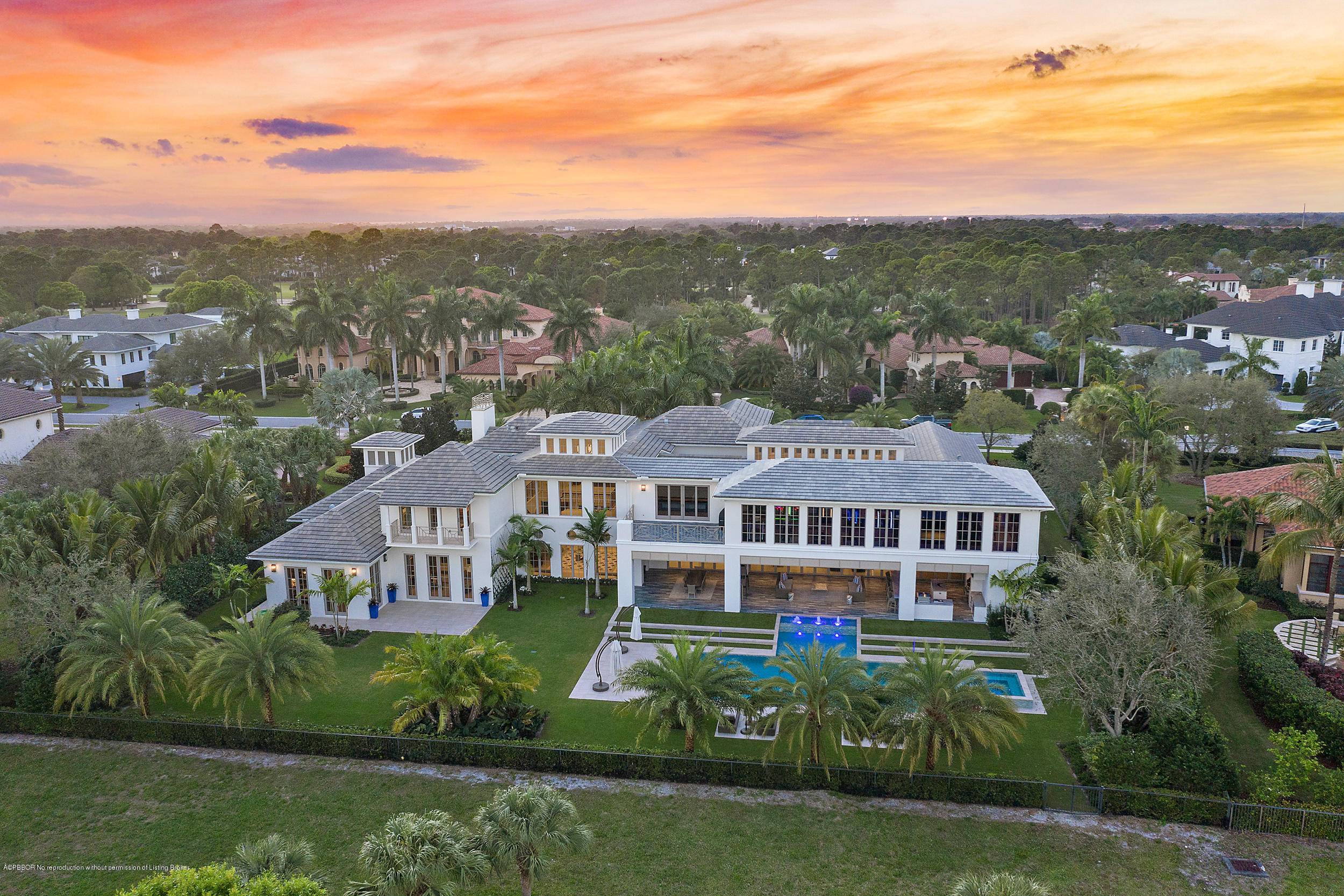 This home is the essence of everything you would want in a property located in the prestigious Old Palm Golf Club.