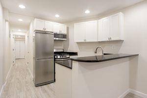 AVAILABLE JUNE 1LAUNDRY IN BUILDINGEnter into this beautifully renovated apartment through a private entrance.